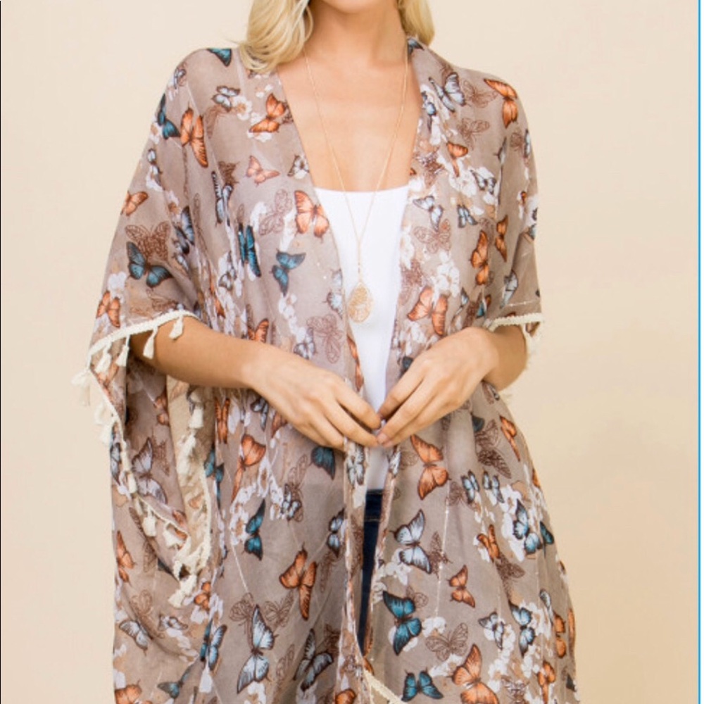 Knee length fringe kimono/cover up.